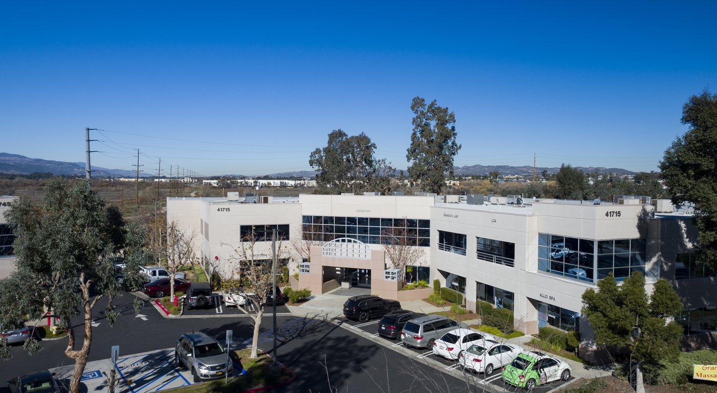Aerial view of Enterprise Court building entrance and parking